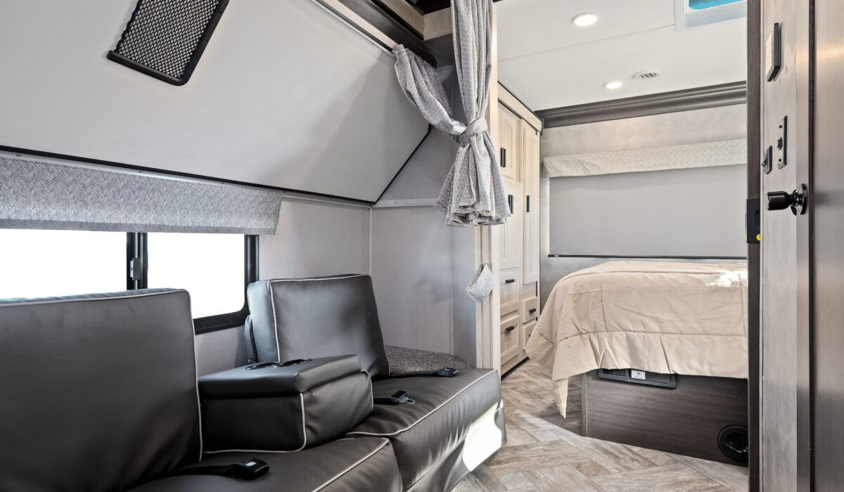 canadream-mhx---top-bunk-folded-up-and-slides-out-in-both-side-sofa-and-rear-bed-areas_51608213804_o